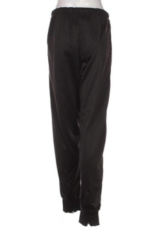 Γυναικείο αθλητικό παντελόνι Givova, Μέγεθος XL, Χρώμα Μαύρο, Τιμή 10,23 €