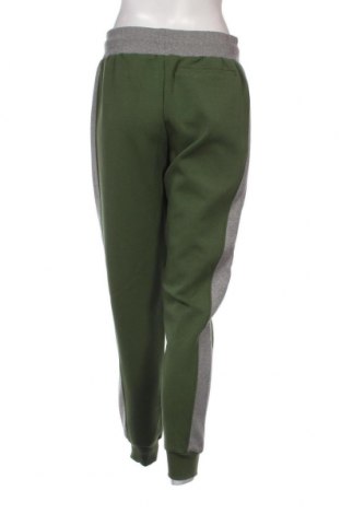 Damen Sporthose Guess, Größe M, Farbe Grün, Preis 63,40 €