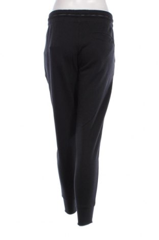 Γυναικείο αθλητικό παντελόνι Under Armour, Μέγεθος L, Χρώμα Μαύρο, Τιμή 44,85 €