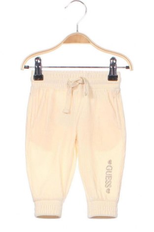 Dětské kalhoty  Guess, Velikost 3-6m/ 62-68 cm, Barva Krémová, Cena  1 174,00 Kč