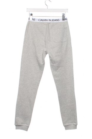 Детско спортно долнище Calvin Klein Jeans, Размер 14-15y/ 168-170 см, Цвят Сив, Цена 107,07 лв.