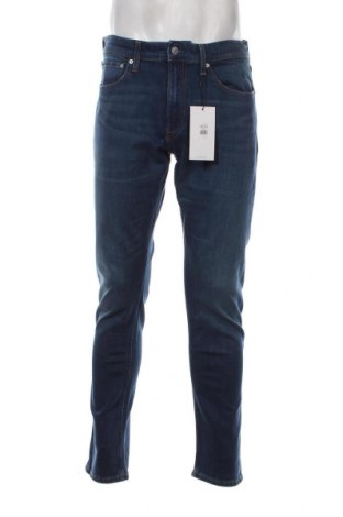 Męskie jeansy Calvin Klein Jeans, Rozmiar M, Kolor Niebieski, Cena 256,20 zł
