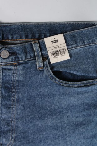 Męskie jeansy Levi's, Rozmiar L, Kolor Niebieski, Cena 291,82 zł