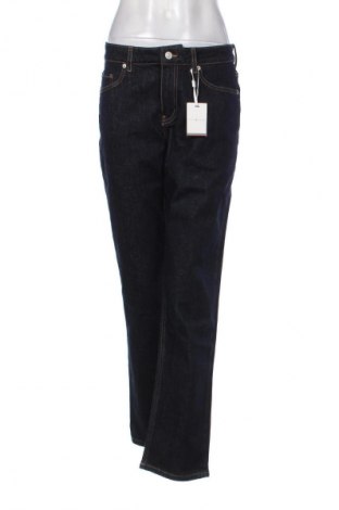 Damskie jeansy Tommy Hilfiger, Rozmiar L, Kolor Niebieski, Cena 654,99 zł