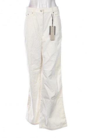 Pantaloni de velvet de femei Tommy Jeans, Mărime L, Culoare Ecru, Preț 229,99 Lei