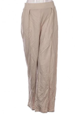 Damskie spodnie H&M, Rozmiar L, Kolor Beżowy, Cena 95,99 zł