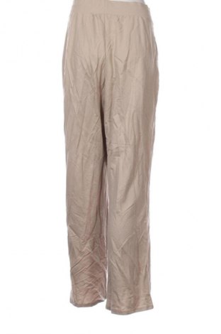 Damskie spodnie H&M, Rozmiar L, Kolor Beżowy, Cena 95,99 zł