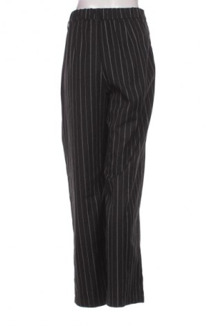 Damskie spodnie H&M Divided, Rozmiar L, Kolor Kolorowy, Cena 24,99 zł