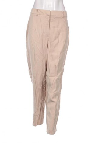 Damskie spodnie TCM, Rozmiar XL, Kolor Beżowy, Cena 24,99 zł