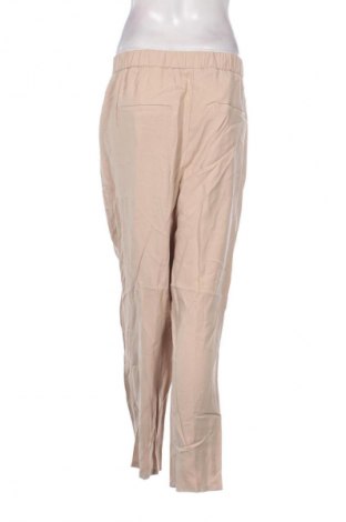 Damskie spodnie TCM, Rozmiar XL, Kolor Beżowy, Cena 24,99 zł