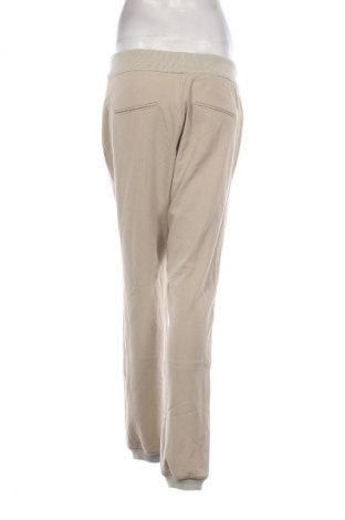 Damskie spodnie Unbranded, Rozmiar M, Kolor Beżowy, Cena 38,99 zł