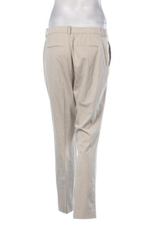 Damskie spodnie Unbranded, Rozmiar M, Kolor Beżowy, Cena 57,99 zł