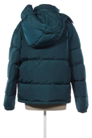 Γυναικείο μπουφάν Tommy Jeans, Μέγεθος L, Χρώμα Πράσινο, Τιμή 197,99 €