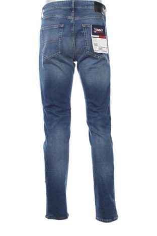Męskie jeansy Tommy Jeans, Rozmiar M, Kolor Niebieski, Cena 564,99 zł