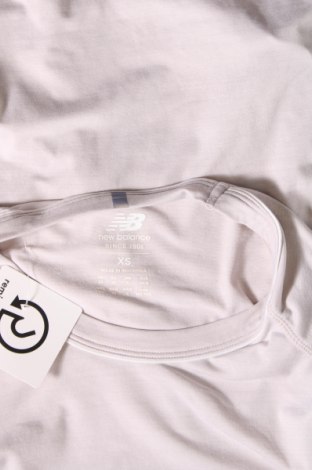 Γυναικεία μπλούζα New Balance, Μέγεθος XS, Χρώμα Γκρί, Τιμή 10,76 €