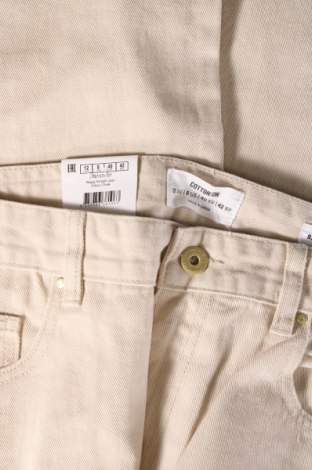 Damskie jeansy Cotton On, Rozmiar M, Kolor ecru, Cena 96,86 zł