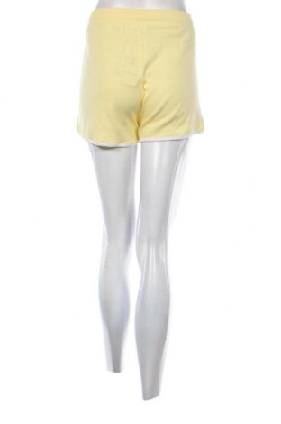 Γυναικείο κοντό παντελόνι Champion, Μέγεθος L, Χρώμα Κίτρινο, Τιμή 26,80 €