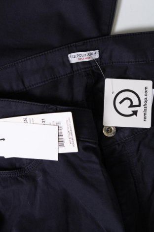 Damskie spodnie U.S. Polo Assn., Rozmiar L, Kolor Niebieski, Cena 155,66 zł