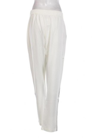 Damskie spodnie U.S. Polo Assn., Rozmiar XL, Kolor ecru, Cena 198,47 zł
