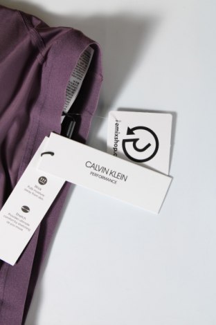 Γυναίκειο αθλητικό τοπ Calvin Klein, Μέγεθος L, Χρώμα Βιολετί, Τιμή 39,69 €