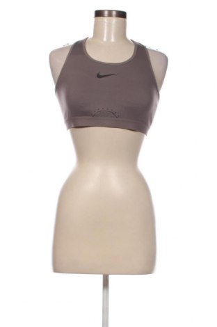 Γυναίκειο αθλητικό τοπ Nike, Μέγεθος XL, Χρώμα Γκρί, Τιμή 14,84 €