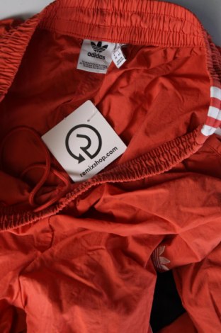 Дамско спортно долнище Adidas Originals, Размер M, Цвят Оранжев, Цена 35,00 лв.