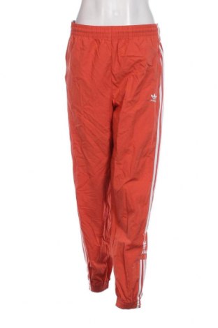 Дамско спортно долнище Adidas Originals, Размер M, Цвят Оранжев, Цена 35,00 лв.
