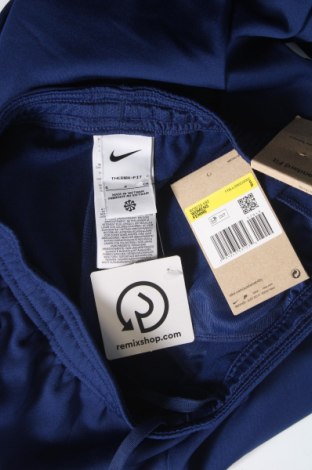 Dámské tepláky Nike, Velikost S, Barva Modrá, Cena  643,00 Kč