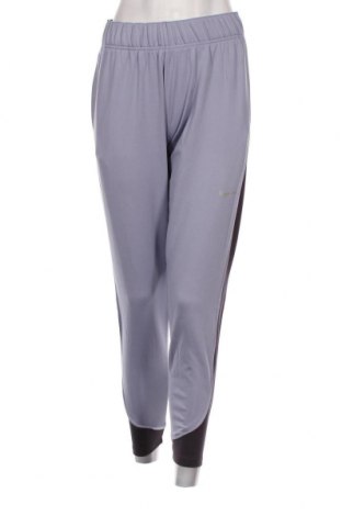 Γυναικείο αθλητικό παντελόνι Nike, Μέγεθος L, Χρώμα Μπλέ, Τιμή 26,91 €