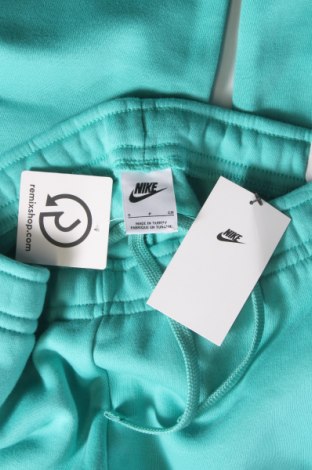 Damskie spodnie sportowe Nike, Rozmiar S, Kolor Niebieski, Cena 118,26 zł