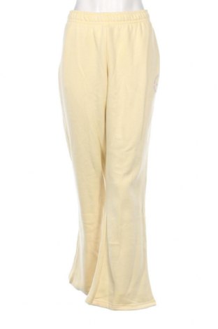 Γυναικείο αθλητικό παντελόνι Nike, Μέγεθος XL, Χρώμα Κίτρινο, Τιμή 15,70 €