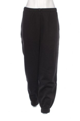 Γυναικείο αθλητικό παντελόνι PUMA, Μέγεθος M, Χρώμα Μαύρο, Τιμή 25,56 €