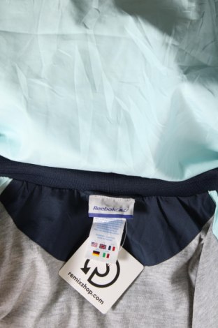 Γυναικείο μπουφάν Reebok, Μέγεθος L, Χρώμα Μπλέ, Τιμή 21,38 €