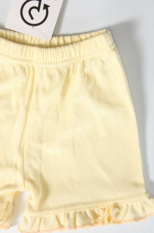 Dětské krátké kalhoty , Velikost 6-9m/ 68-74 cm, Barva Žlutá, Cena  90,00 Kč