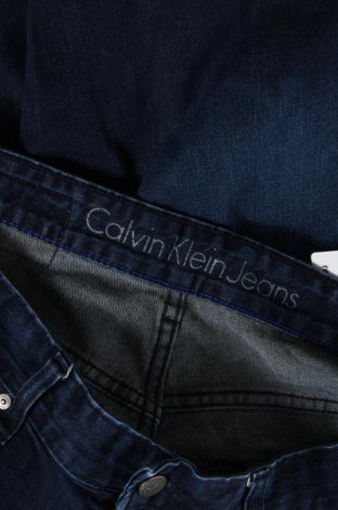 Męskie jeansy Calvin Klein Jeans, Rozmiar M, Kolor Niebieski, Cena 235,80 zł