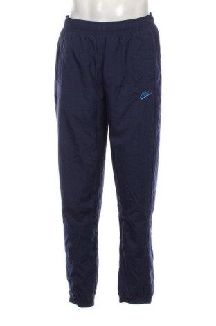 Pantaloni trening de bărbați Nike, Mărime M, Culoare Albastru, Preț 277,59 Lei