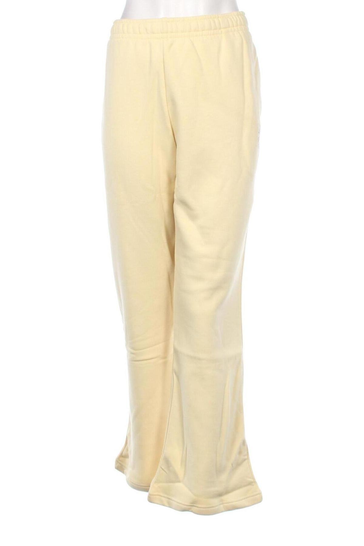 Γυναικείο αθλητικό παντελόνι Nike, Μέγεθος XXL, Χρώμα Κίτρινο, Τιμή 10,76 €