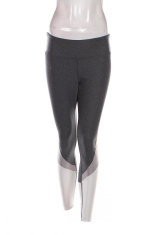 Damskie legginsy H&M Sport, Rozmiar L, Kolor Kolorowy, Cena 59,48 zł