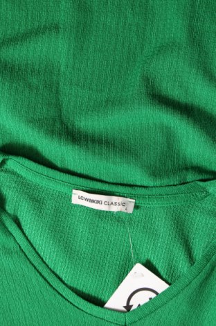 Дамска блуза LC Waikiki, Размер L, Цвят Зелен, Цена 16,53 лв.