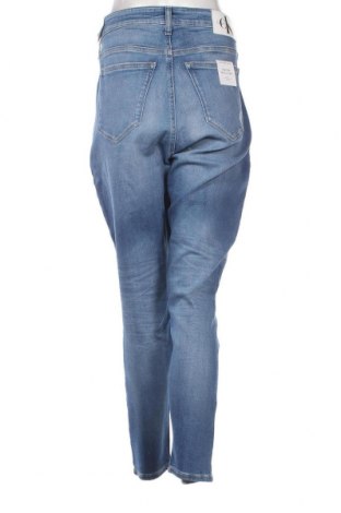 Damskie jeansy Calvin Klein, Rozmiar XL, Kolor Niebieski, Cena 331,21 zł