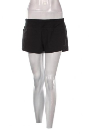 Γυναικείο κοντό παντελόνι Nike, Μέγεθος M, Χρώμα Μαύρο, Τιμή 21,03 €
