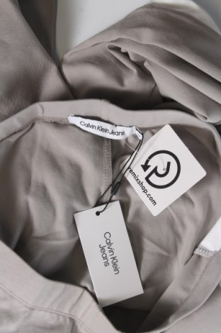 Dámske legíny  Calvin Klein Jeans, Veľkosť M, Farba Sivá, Cena  23,81 €