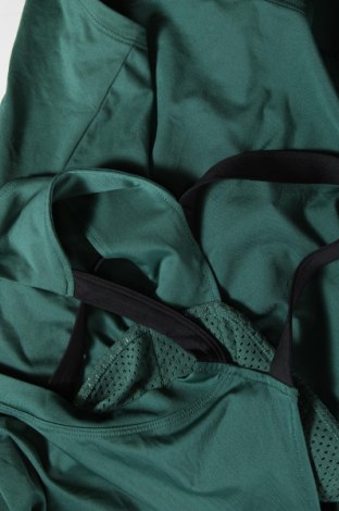 Γυναικείο αμάνικο μπλουζάκι Under Armour, Μέγεθος M, Χρώμα Πράσινο, Τιμή 30,59 €