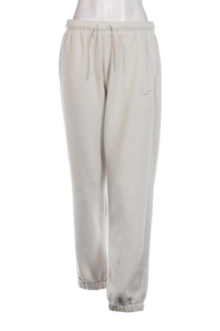 Γυναικείο παντελόνι fleece Nike, Μέγεθος S, Χρώμα  Μπέζ, Τιμή 28,76 €
