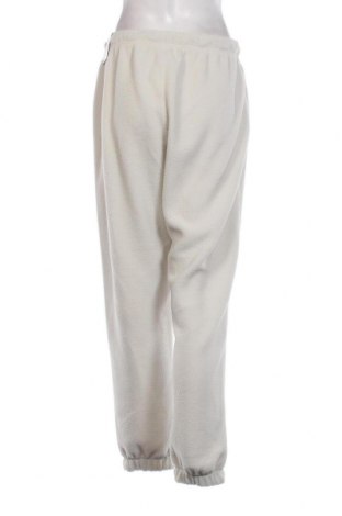 Γυναικείο παντελόνι fleece Nike, Μέγεθος S, Χρώμα  Μπέζ, Τιμή 47,94 €