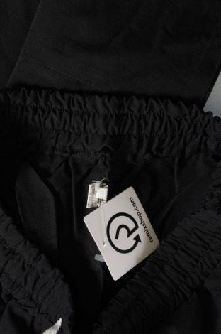 Γυναικείο αθλητικό παντελόνι, Μέγεθος L, Χρώμα Μαύρο, Τιμή 8,01 €