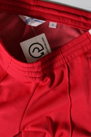 Damskie spodnie sportowe Adidas Originals, Rozmiar M, Kolor Czerwony, Cena 131,14 zł