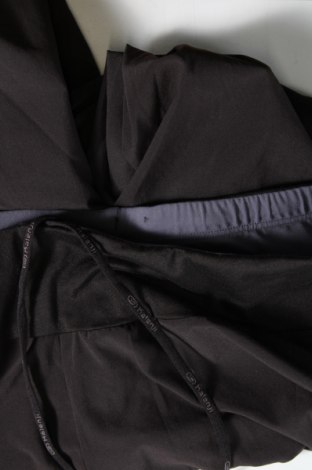 Γυναικείο αθλητικό παντελόνι Kalenji, Μέγεθος XL, Χρώμα Μαύρο, Τιμή 14,84 €