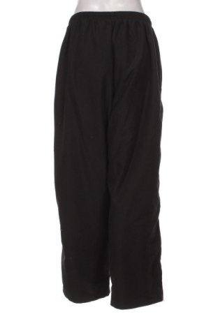 Γυναικείο αθλητικό παντελόνι Kiwi, Μέγεθος XL, Χρώμα Μαύρο, Τιμή 7,47 €