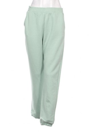 Damen Sporthose Kookai, Größe M, Farbe Grün, Preis 27,33 €